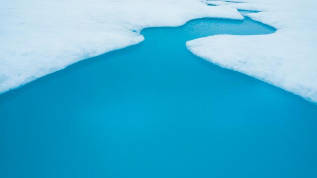 Kayaking in Crystal Clear Blue River in Greenland