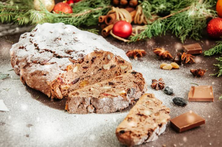 Slices of Chocolate Stollen sprinkled with powdered sugar