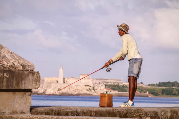 Fisherman with rod on Malecon