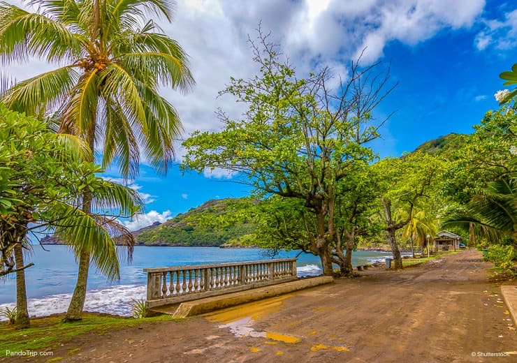 Muddy road at the ocean on Nuku Hiva, Marquesas Islands, French Polynesia