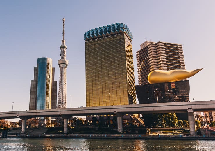 View of the Tokyo Skytree and the Asahi Beer Hall from across Sumida river