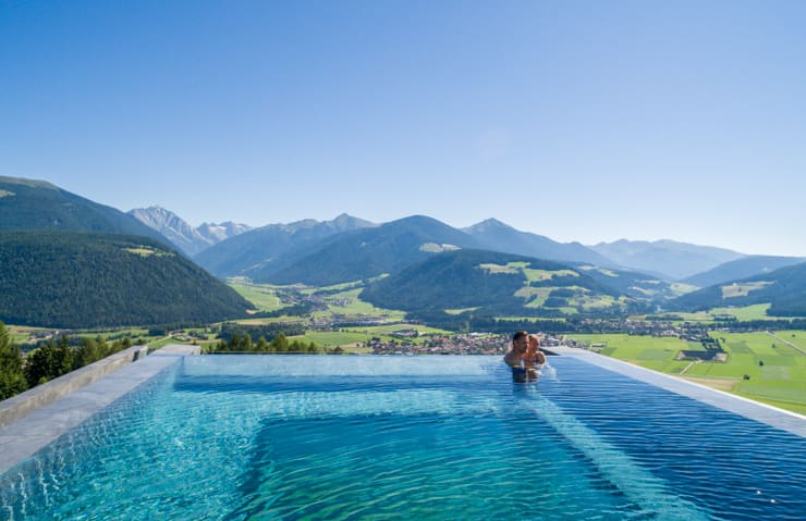 Amazing view from pool at Aerial view of infinity poll at Alpin Panorama Hotel Hubertus, Italy