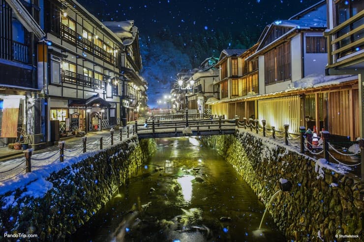 Historic ryokan lined up along the Ginzan River, Ginza Onsen, Japan