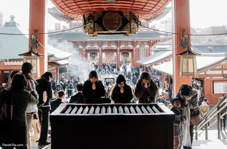 People praying at Praying at Senso-ji Temple in Asakusa