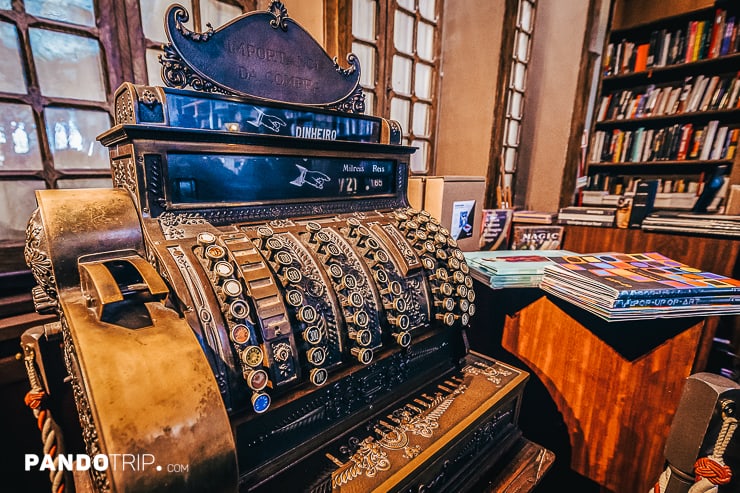 Antique cash register at Livaria Lello