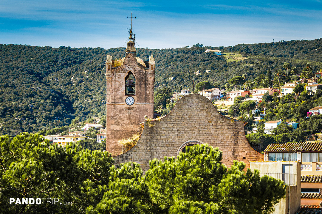 Close-up view of the Church of Sant Martí in Calonge with its distinctive Gothic bell tower