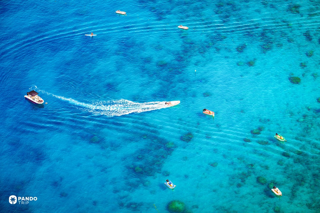 Aerial view of Ölüdeniz Blue Lagoon in Fethiye, Turkey, with turquoise water and sandy spit