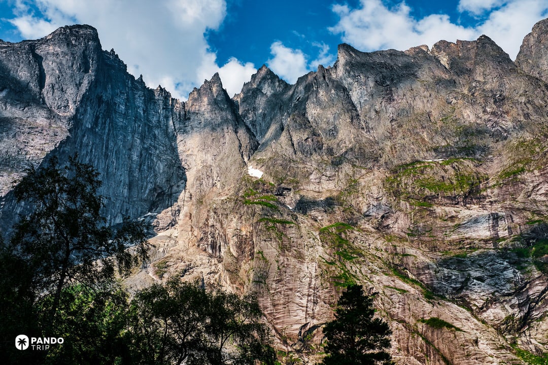 Close view of Troll Wall’s fractured gneiss face with pinnacles and corners